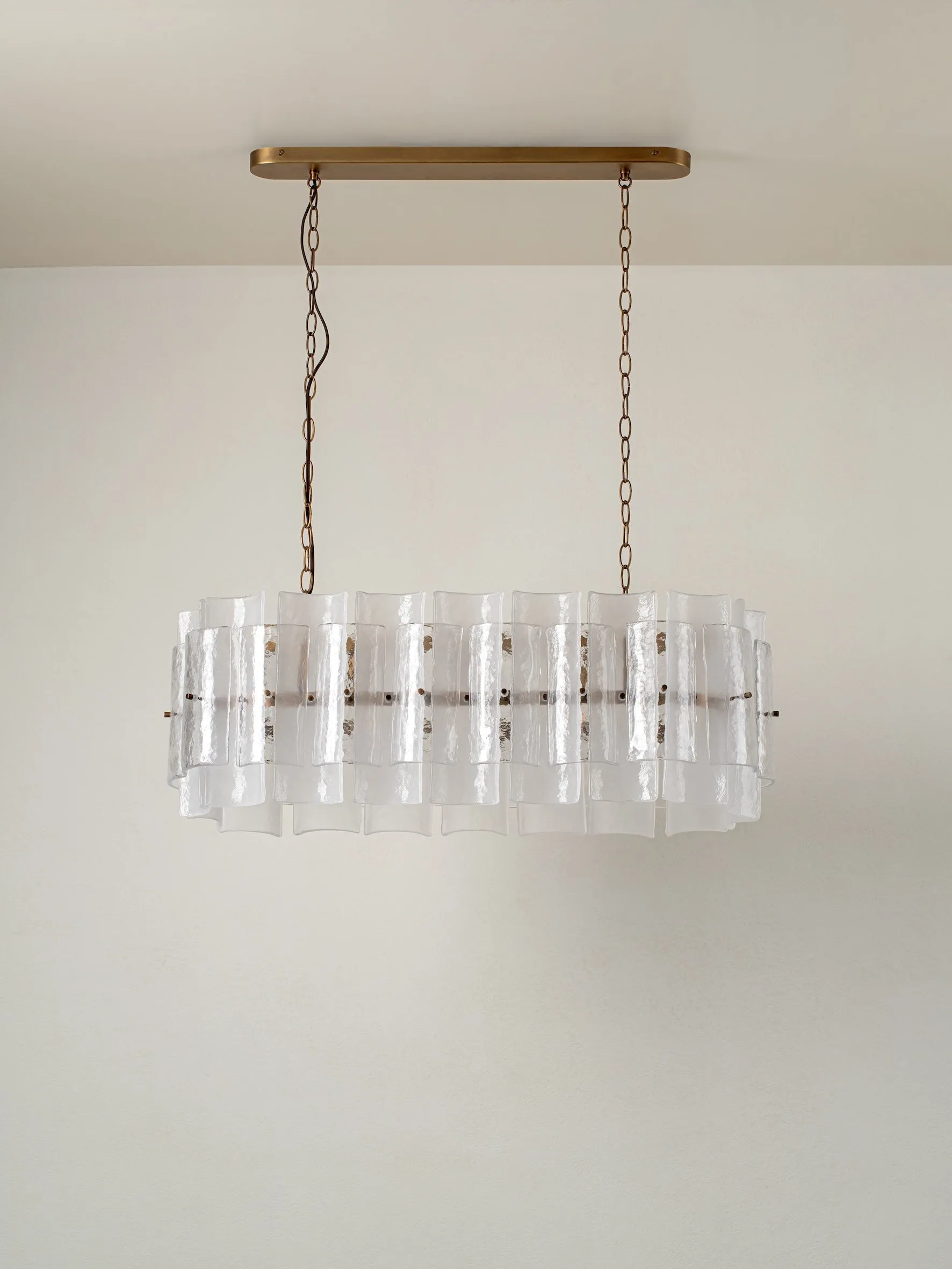 Pazo - 9 light layered textured glass oval chandelier