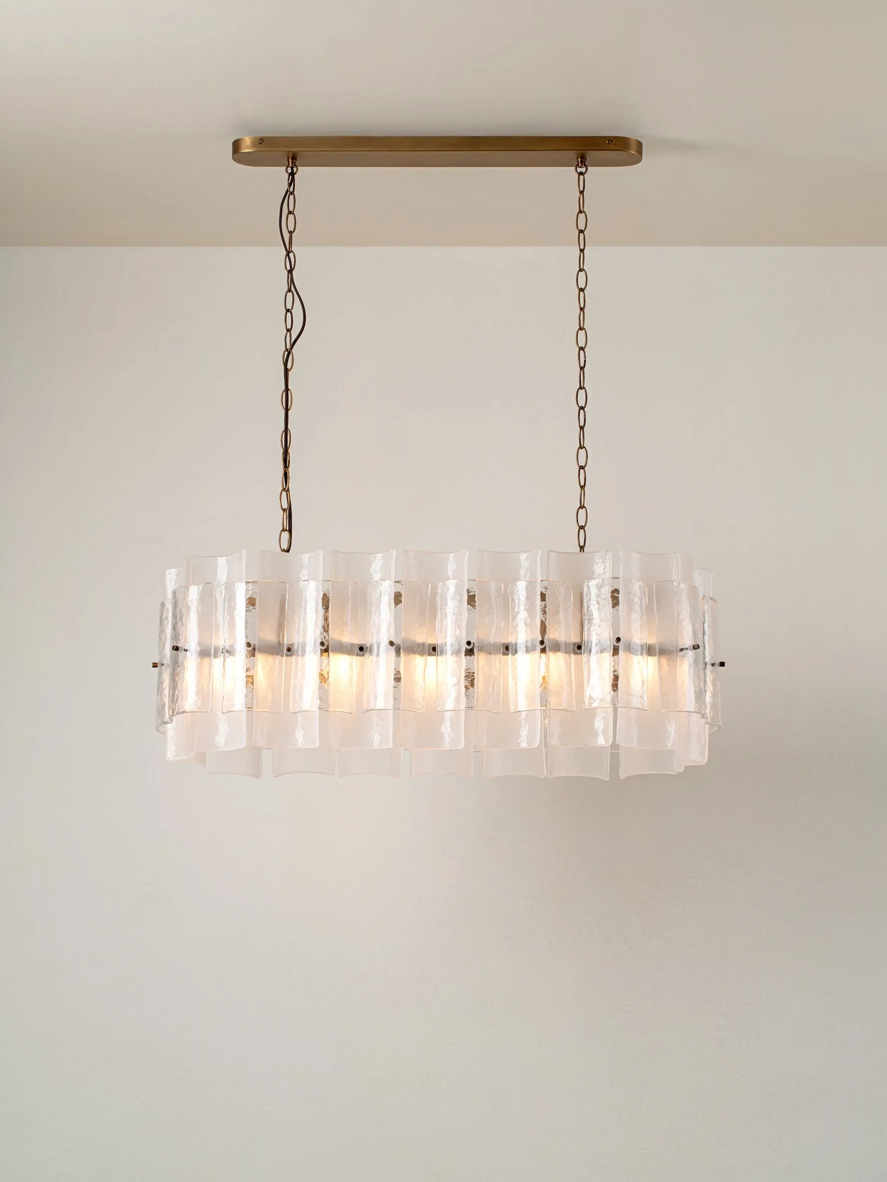 Pazo - 9 light layered textured glass oval chandelier